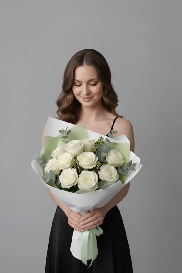 Elegant White Avalanche Rose and Eucalyptus Bouquet (10 stems) delivered same day in London by The London Bloom.
