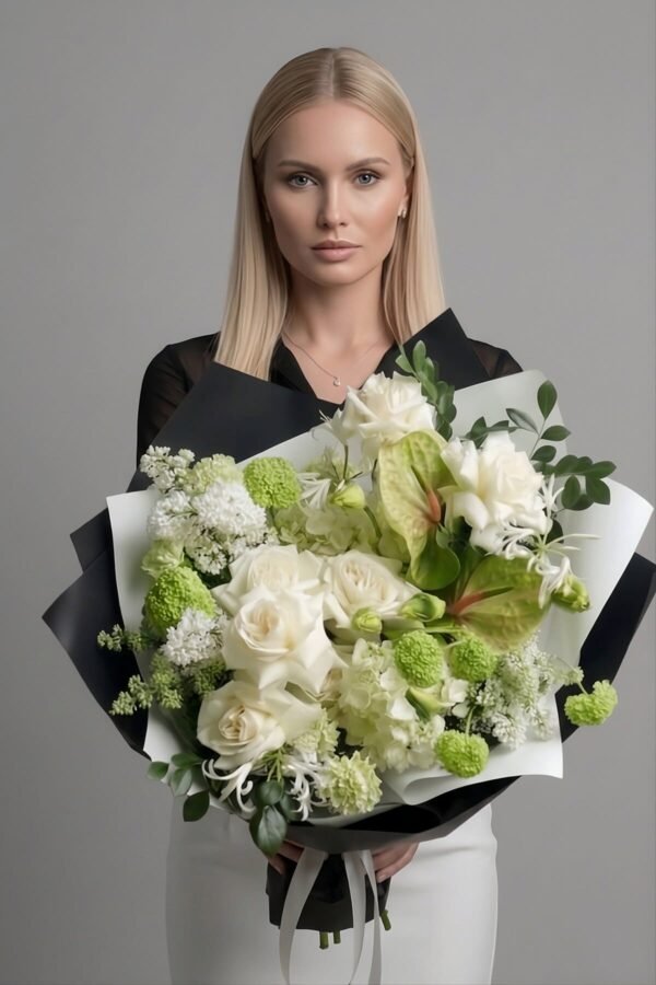 Evergreen Zenith Bouquet featuring premium Avalanche roses, white hydrangea, vibrant green anthurium, nerine, viburnum, and ruscus, creating a luxurious and textured white and green arrangement, delivered same day in London by The London Bloom.
