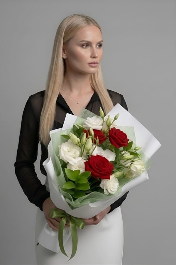 just-for-you-bouquet The just for you bouquet from The London Bloom containing red roses, white roses, white lisianthus, and green foliage.